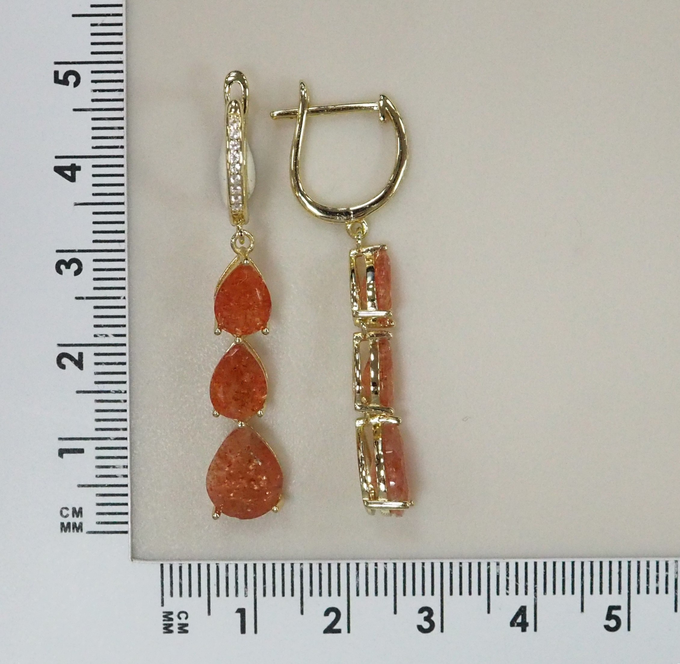 Серебряные серьги с солнечными камнями